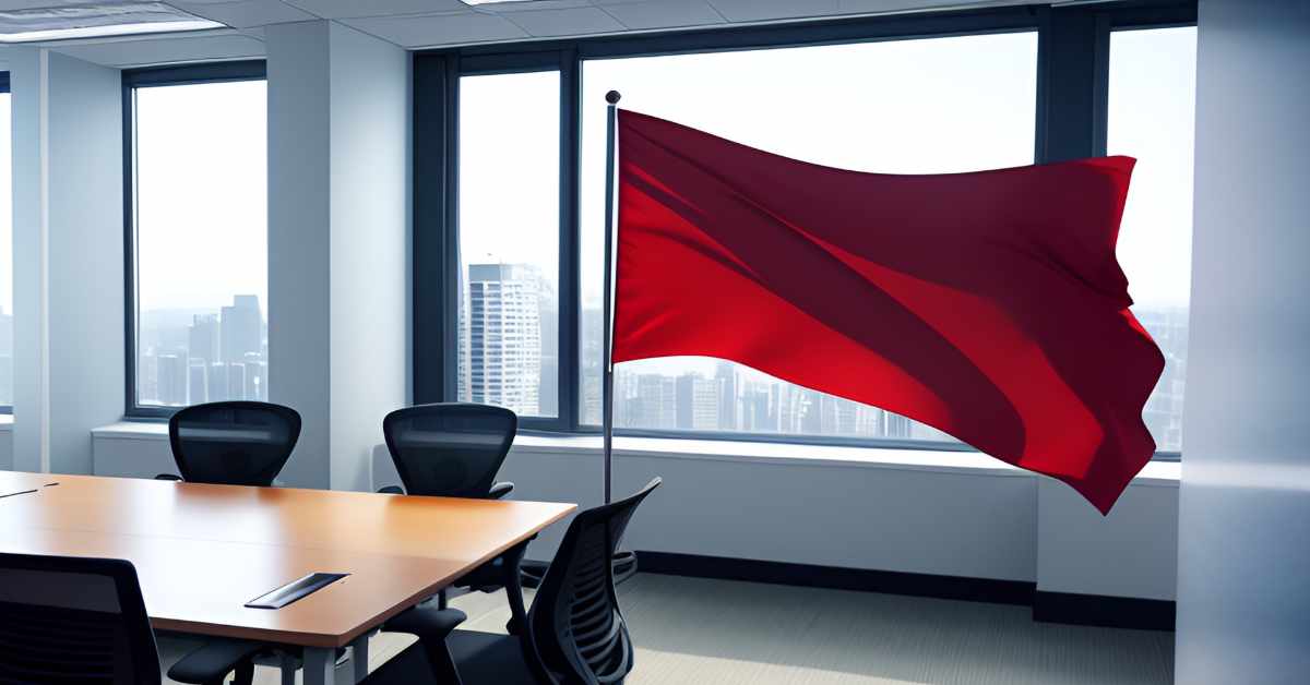 A red flag warns of the dangers of an NFT scam.